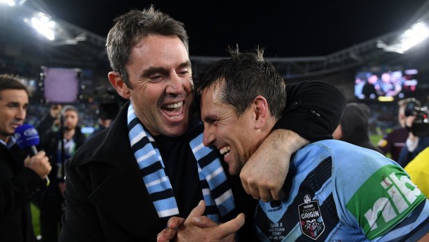 Happy days: Brad Fittler and Mitchell Pearce celebrate a remarkable Origin series win. But it wasn't all smiles for the Blues coach.