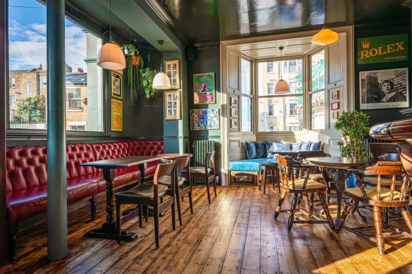 The vibrant, historic pub features original works by Rose Blake.