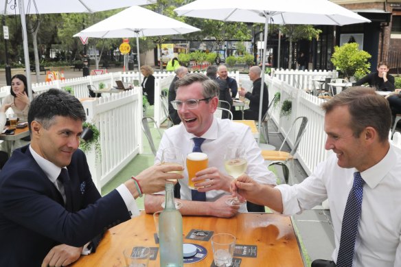 Minister for Customer Service Victor Dominello (left), NSW Treasurer Dominic Perrottet and Minister for Planning and Pubic Spaces Rob Stokes in The Rocks last year.