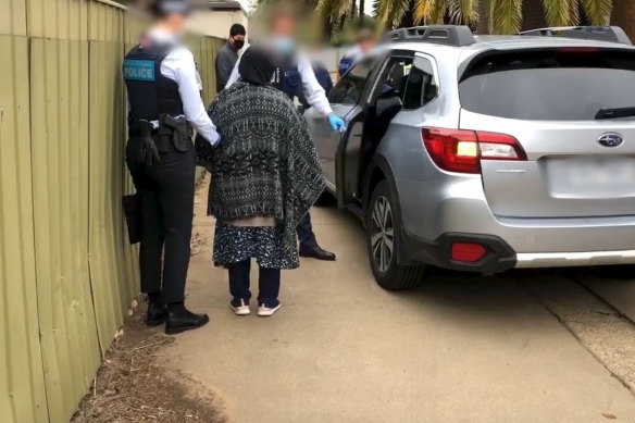 Australian Federal Police arrest Sakina Muhammad Jan in October 2020.