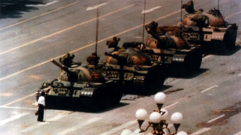 A man stands in front of tanks in Tiananmen Square in Beijing China on June 4, 1989.