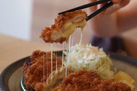 Katsu katsu is an onomatopoeic phrase used to describe the sound of crunchy food. You’ll hear that crunch a lot here. 