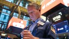 Wall Street finished flat to open its week.