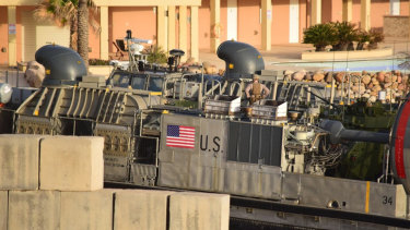 A US amphibious hovercraft prepares to depart with evacuees from Janzur, west of Tripoli, Libya. 