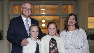 Prime Minister Scott Morrison in 2018 with his wife Jenny and daughters Abigail and Lily, who he said will be getting vaccinated in the coming months now over-12s are included in the rollout.