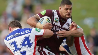 Mason runs the ball up for the Sea Eagles.