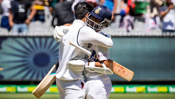 India captain Ajinkya Rahane, right, celebrates with teammate Shubman Gill after their victory in the second Test at the MCG.