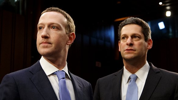 Mark Zuckerberg, Facebook’s chief executive, and Joel Kaplan, its vice-president of global public policy, arrive to testify on Capitol Hill in Washington. 