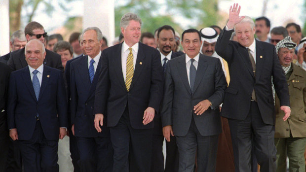 Egyptian President Hosni Mubarak with world leaders including US President Bill Clinton at the March 13, 1996, Summit for Peacemakers in Egypt.