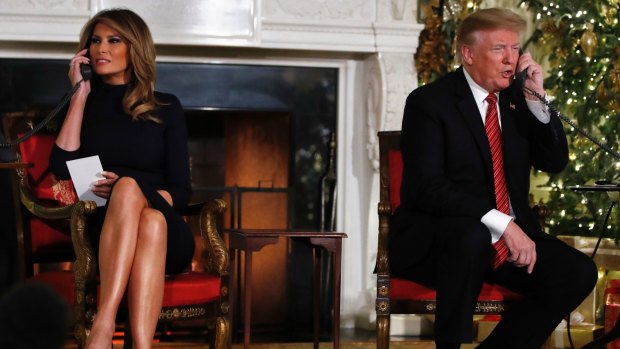 President Donald Trump and first lady Melania Trump speak to children about Santa's movements on Christmas Eve.