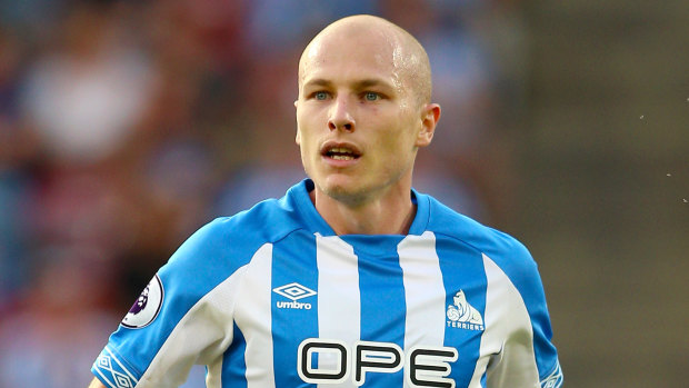 Sidelined: Huddersfield's Aaron Mooy will miss Australia's clash with Kuwait.