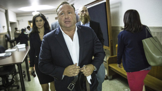 "Infowars" host Alex Jones arrives at court in April for a child custody battle. 