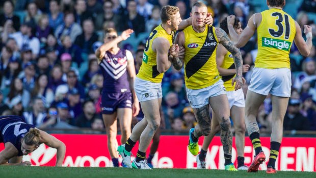 Richmond and Dustin Martin celebrate during the round 22 thrashing of Fremantle at Subiaco Oval.