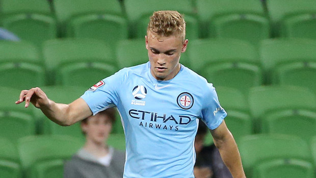 Nathaniel Atkinson, seen in action for Melbourne City, scored but it wasn't enough for the Young Socceroos.