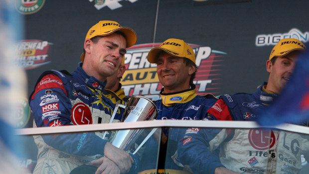 Emotional win: Craig Lowndes (left) hugs the Peter Brock Trophy as he weeps moments after winning the Bathurst 1000 in 2006.