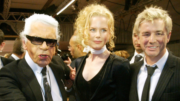 Karl Lagerfeld with Nicole Kidman and Baz Luhrman after the presentation of Chanel's spring-summer collection in 2005. 
