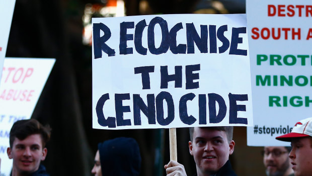 Demonstrators at a Sydney rally Lauren Southern attended. 