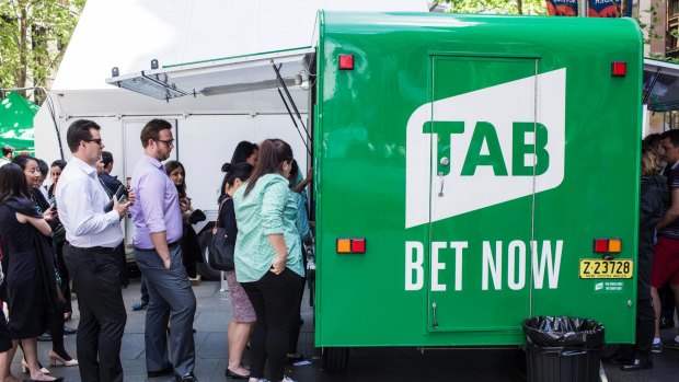 Gaming analysts are predicting Tabcorp will continue to face 'headwinds' from online bookie rivals.