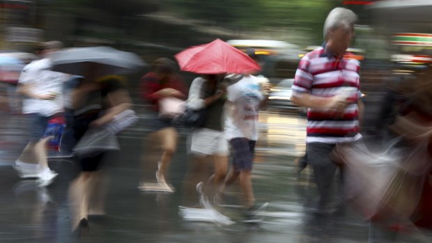Brisbane commuters are caught in a soaking afternoon.
