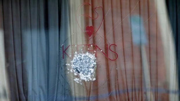 A bullet hole in the window of Kittens strip club in South Melbourne in May 2016.