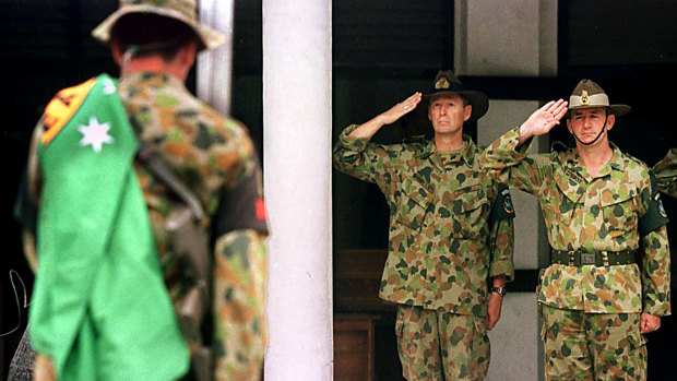 Major General Peter Cosgrove, right, commanded the Australian-led INTERFET deployment to East Timor. 