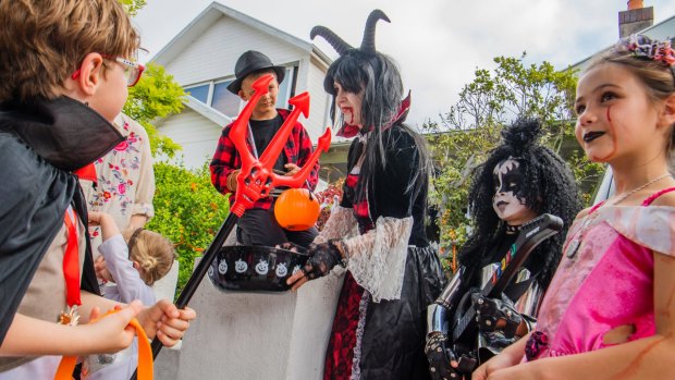 Halloween kids trick or treat on Hastings Parade in Bondi.