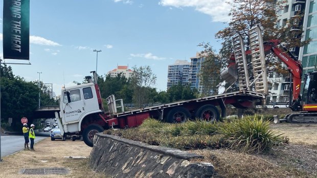 The cabin of the truck appeared to be wedged off the ground in Woolloongabba, just south of the Story Bridge.