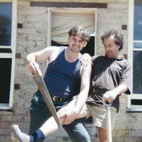 Glover and his co-builder and friend Philip Clark during the construction of the house.