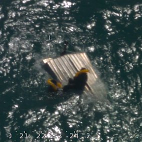 Two people were plucked from an overturned boat near Garden Island earlier this week.