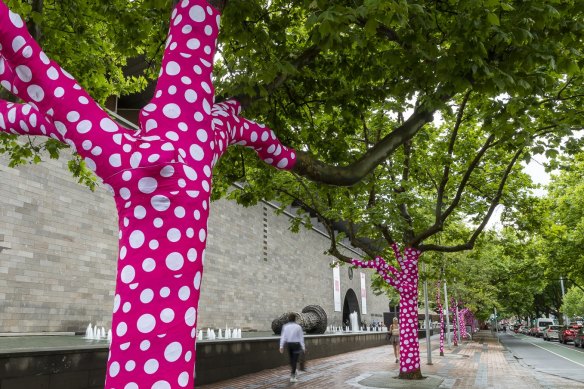 Sixty-five plane trees lining St Kilda Road in the heart of Melbourne have been wrapped in Yayoi Kusama’s trademark polka dots.