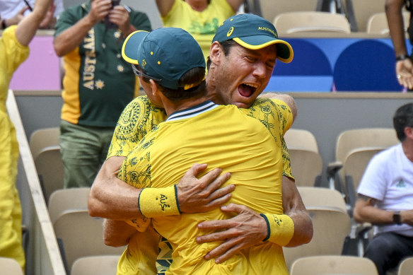 Matt Ebden and John Peers celebrate their gold medal win in the men’s doubles.