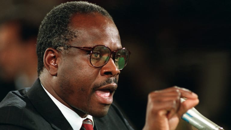 In 1991, then-US Supreme Court nominee Judge Clarence Thomas denounces and denies sexual harassment allegations made by Anita Hill against him before the Senate Judiciary Committee on Capitol Hill in Washington.