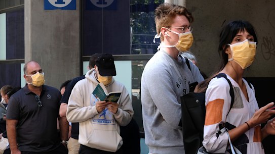 People line up outside the Royal Melbourne Hosital for coronavirus testing on Tuesday.