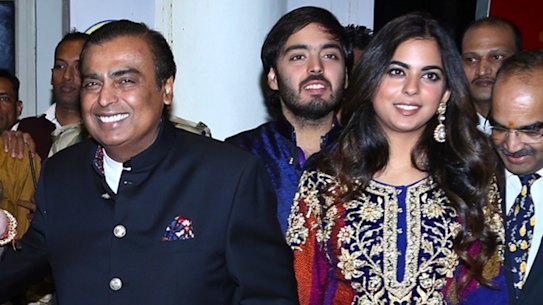 Mukesh Ambani and daughter Isha Ambani, whose "big, fat Indian wedding" is set to cost $139 million.