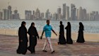 Qataris enjoy a promenade in Doha. The country has one of the highest levels of GDP per capita in the world.