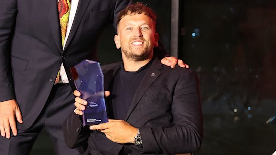 Prime Minister Scott Morrison and 2022 Australian of the Year Dylan Alcott.