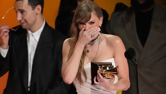 Taylor Swift wins album of the year.