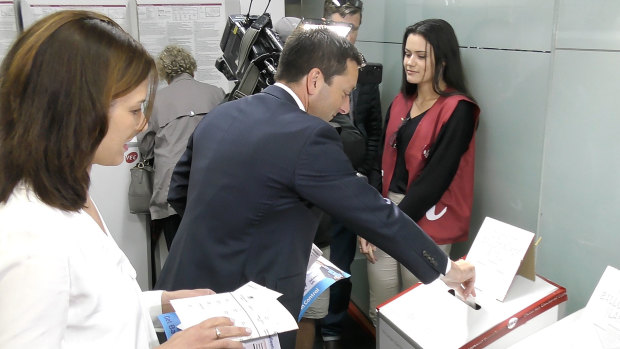 Matthew Guy casts his vote early.