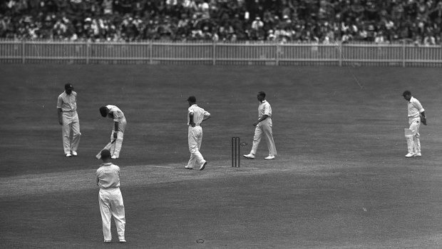 Australian batsman Stan McCabe doubles up after being hit by English bowler Harold Larwood on the shoulder in the fifth Test at the Sydney Cricket  Ground during the 1932-33 Ashes Series (the Bodyline Series), February 1933.