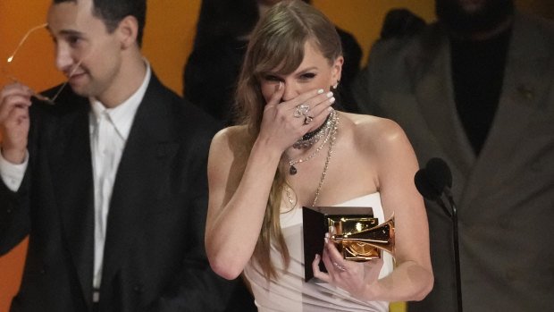 Taylor Swift wins album of the year.