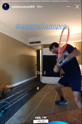 Pablo Cuevas practises his backhand in hotel quarantine ahead of the Australian Open. 