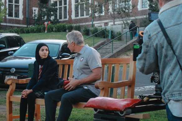 Setara Amiri and Brad Hodge film a scene for My Melbourne. 