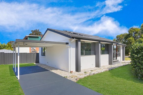 This Marayong house sold at auction for $1,015,000 to the Rahmani family with the aid of a Persian translator from the Tesolin office.