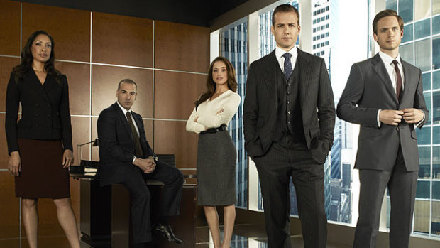 The main cast of Suits featuring Meghan Markle (third from right) and Gabriel Macht (fourth from right).