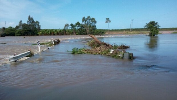The bridge across Palm Creek washed away over the weekend after major flooding in Ingham, north Queensland.
