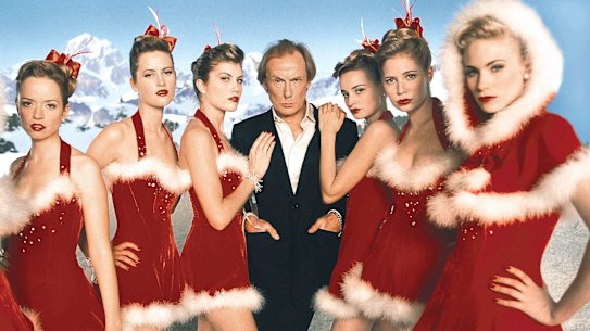 Bill Nighy as Billy Mack and his friends in Love Actually.