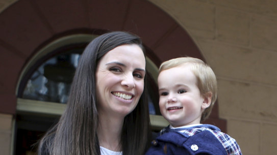 Labor MP Courtney Houssos with her son Arthur (aged 2) at state Parliament. 