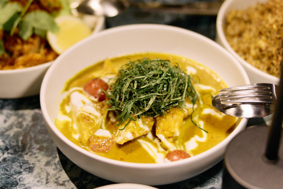 Hiramasa kingfish curry with coconut, turmeric, cherry tomatoes, kaffir lime and betel leaf.