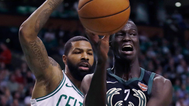 Locked down: Thon Maker is guarded by Marcus Morris.