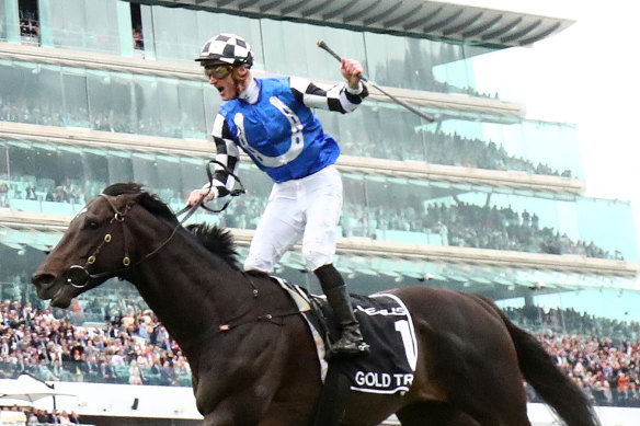 Gold Trip takes out the Melbourne Cup in the Australian Bloodstock  silks.